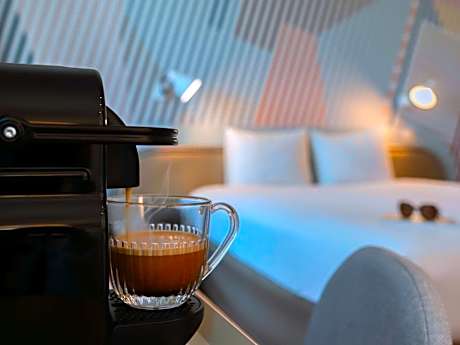 Junior Queen Suite with a Double Sofa Bed and Balcony