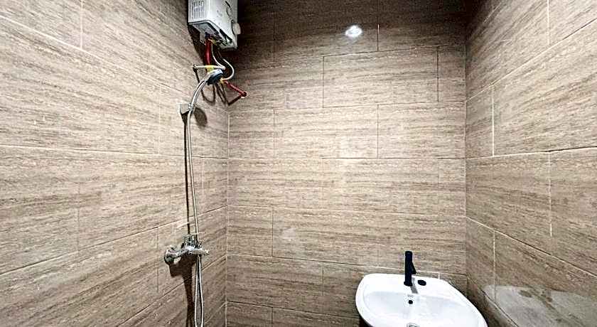 Tini's Guest House Malang Mitra RedDoorz