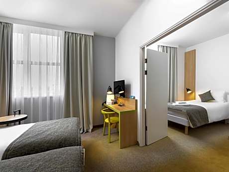 family room with one double and one single bed