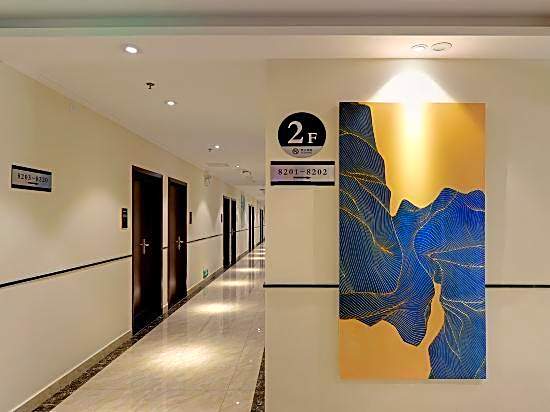 Xingyi Chain Hotel Jiangxia Metro Station
