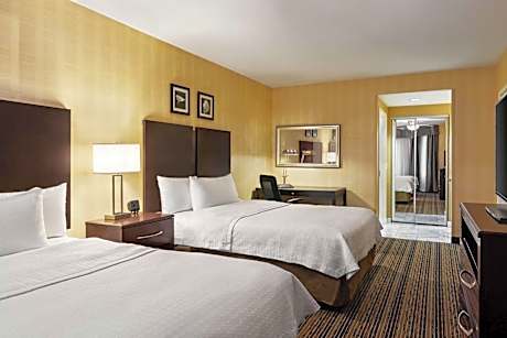 Two Bedroom Suite with One King and Two Queen Beds - Non-Smoking