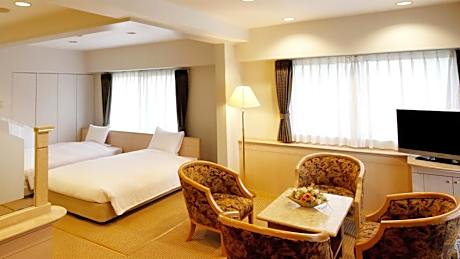 Deluxe Room - 2 Beds and 1 Sofabed