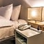 Check Inn Hotel