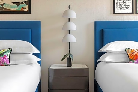 Essential Queen Room with Two Queen Beds and City View