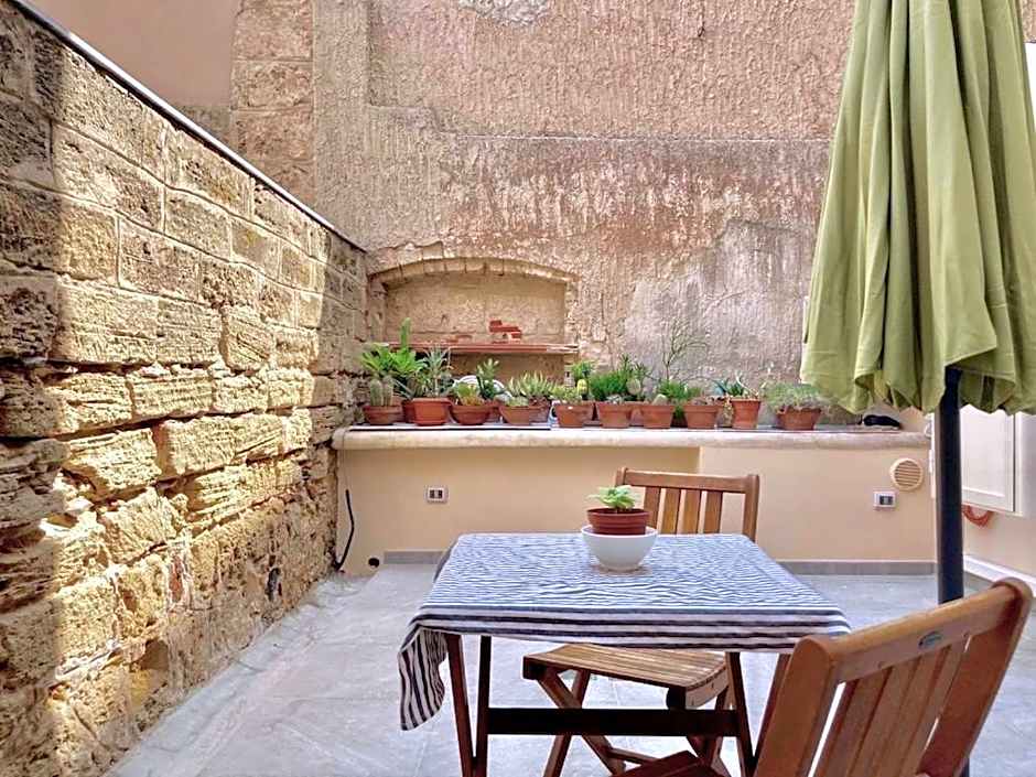 ClickSardinia Alghero Spectacular waterfront Neptune apartment with sea-facing terraces and garden