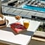 115 The Strand Hotel by NEU Collective