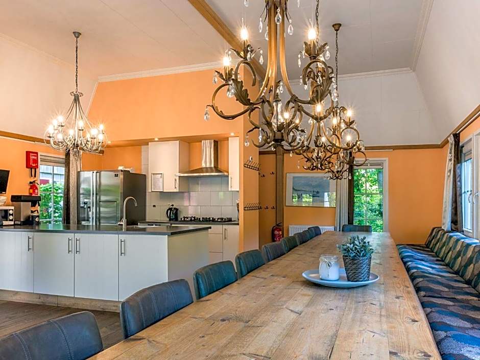 Designed home with bedstead, surrounded by forest