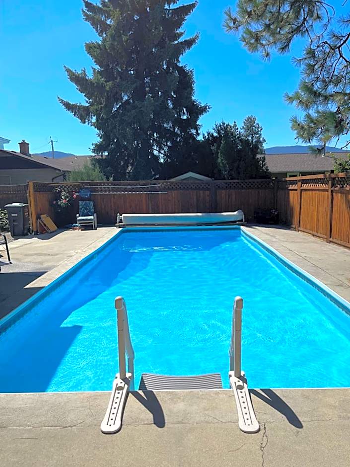 Bright poolside walkout two bedroom basement suite in the Okanagan