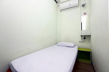 Single Bed in Dormitory Room