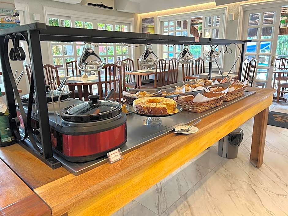 Fabuloso flat 243 Amarílis 2 piscinas climatizadas, carregador veiculo elétrico Riviera de São Lourenço, Bertioga Apartamento Duplex inteiro, cozinha equipada completa, serviço de praia, limpeza e trocas diária de toalhas, wi-fi 500mb