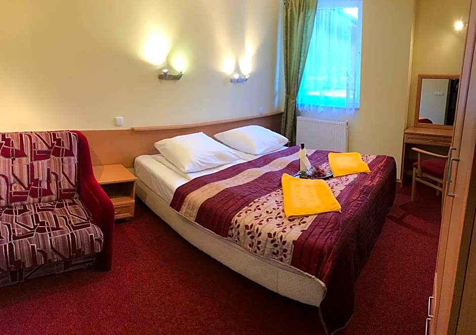 Okulski Grand Rozewie Pokoje i Apartamenty