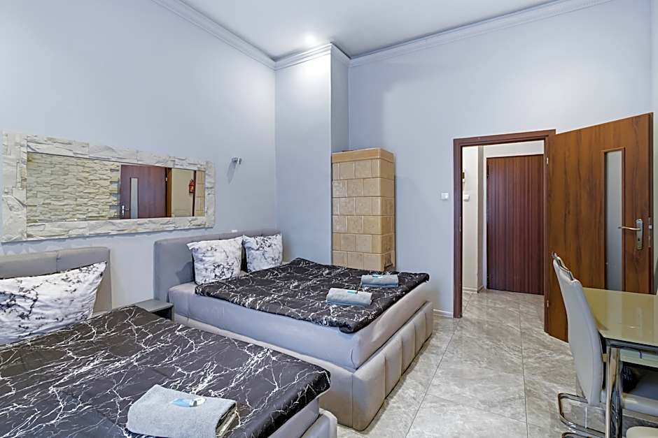 Queen Apartments