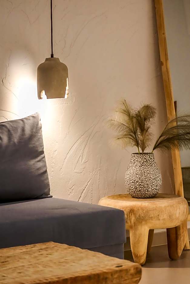 Delfini Beach Hotel & Suites