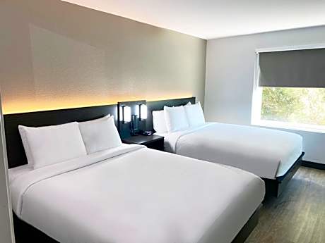 Suite with Two Queen Beds and Kitchen and Separate Bedroom - Non-Smoking