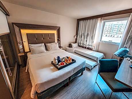 Family room with 1 double bed and 1 sofa bed.