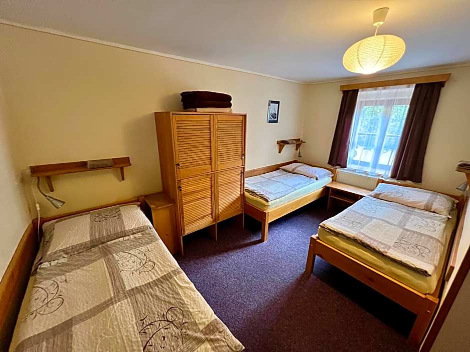 Photo 1 of 3 of Triple Room with Shared Bathroom