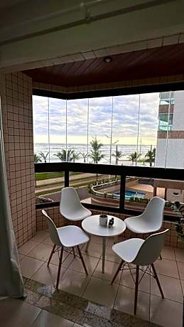 Belo apartamento de frente ao mar - Vila Caiçara