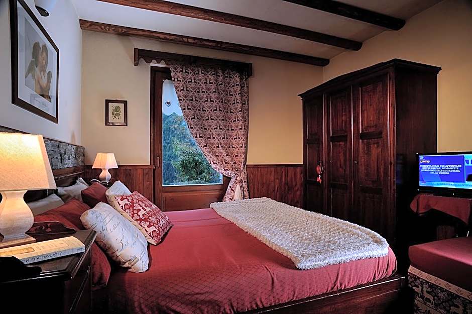 Aparthotel Foyer d'antan SUITE con caminetto hammam o vasca idromassaggio