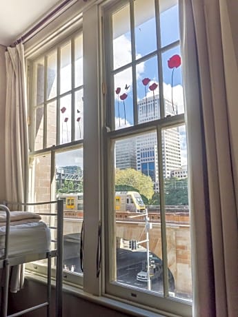 Bed in 8-Bed Mixed Dormitory Room with Shared Bathroom (ages 18-40 years only)
