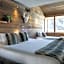 Hôtel Ski Lodge - Chambres & Appartements - Village Montana