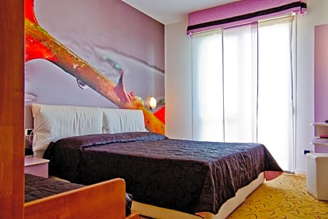 Triple Room (2 Adults + 1 Child)