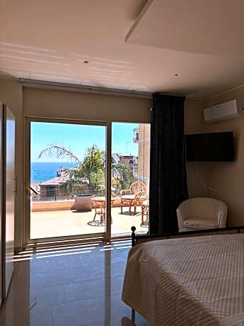 One-Bedroom Apartment with Balcony and Sea View