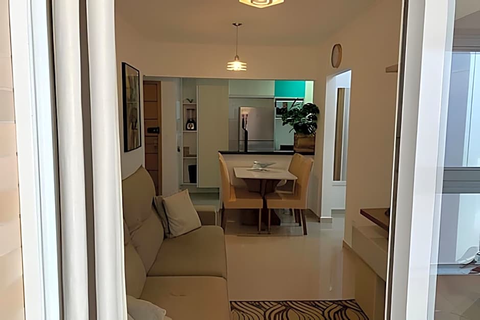 Apartamentos aconchegantes frente mar