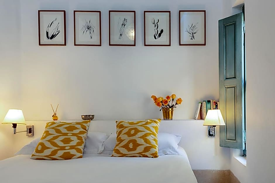 Riad Le J