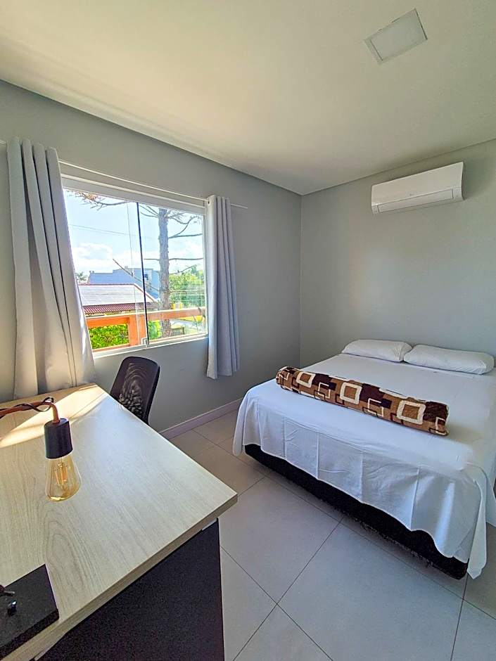 Casa no segundo andar na Praia da Cal com ar e sacada