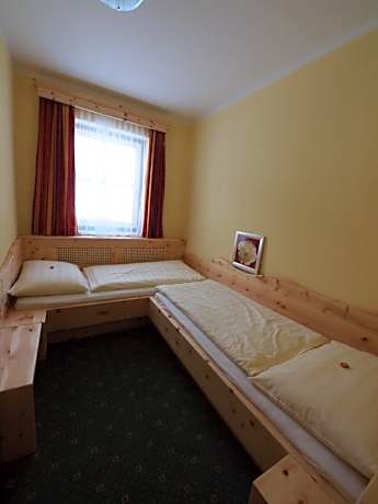 Family Suite (2 Adults + 2 Children)