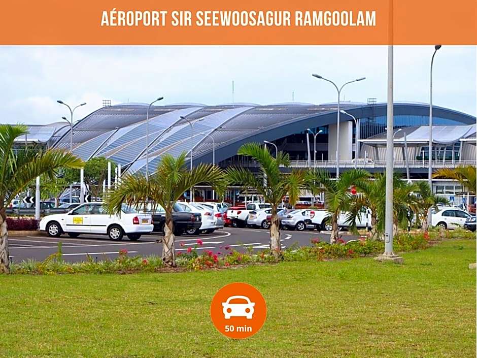 Villa Alizée - Boutique Hôtel Expérience - Idéal Couples & Pros - Piscine - Restaurant - Rooftop bar - Parking privé - 10min Port-Louis - Ambiance Tropical chic & authentique