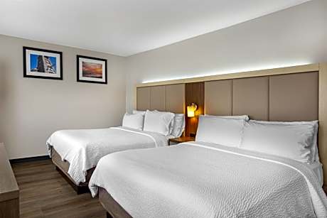2 Double Beds Non-Smoking Mini Fridge Wi-Fi Walk In Shower Full Breakfast