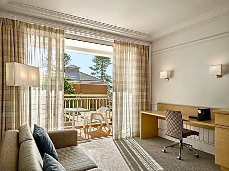 Standard Queen Room with Two Queen Beds and Balcony