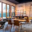 White Wall Riverfront Hotel