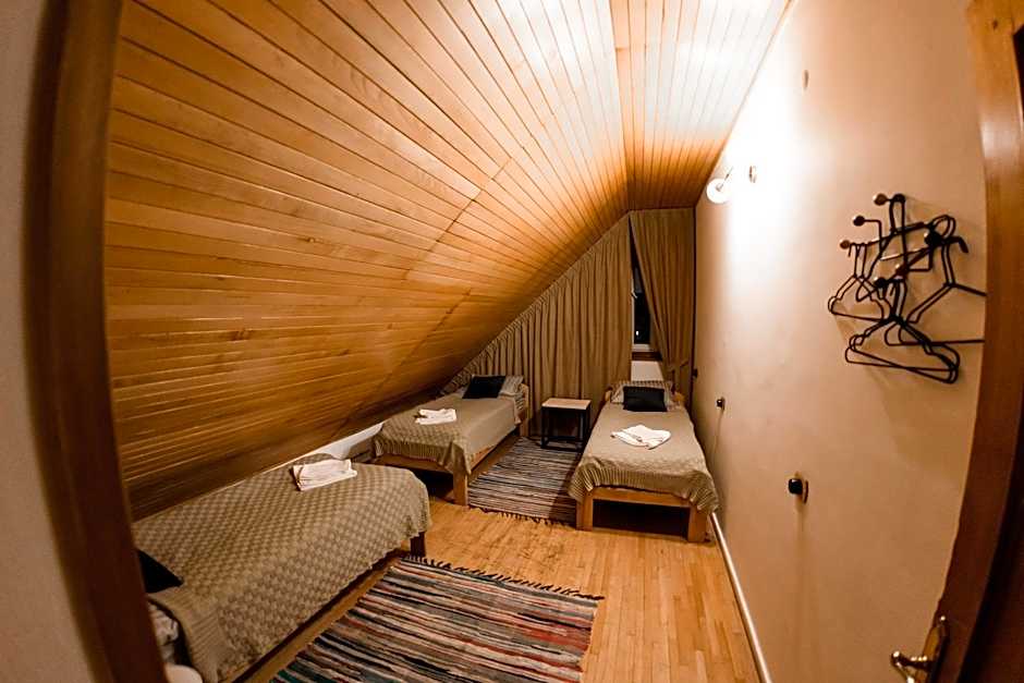 Photo 1 of 8 of Triple Room with Shared Bathroom