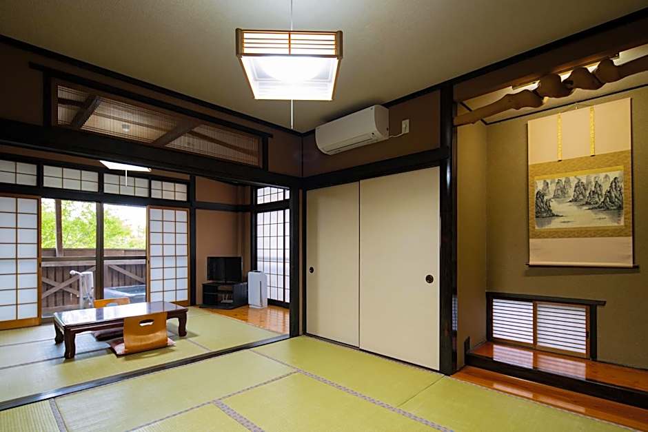 Photo 1 of 12 of Quadruple Room with Private Bathroom