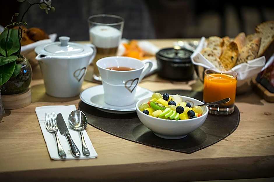 Au Coeur Du Village Hotel