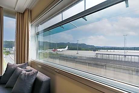 Family Room with Fjord and Runway View