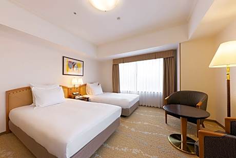 Premium Room with One Queen and One Single Bed