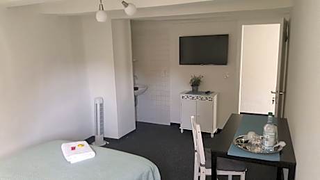 Single Room with Shared Shower and Toilet