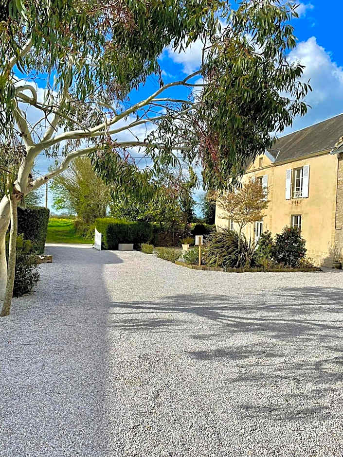 Les chambres d'Omaha Beach Etablissement avec deux chambres d'hôtes, petit-déjeuner compris fait-maison et produits locaux