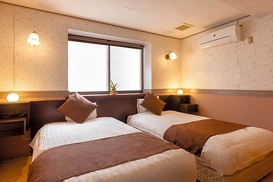 Photo 1 of 7 of Quadruple Room