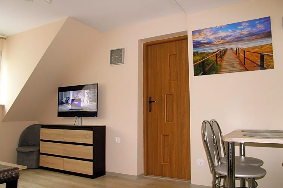 Sztil - Apartamenty i drewniane domki