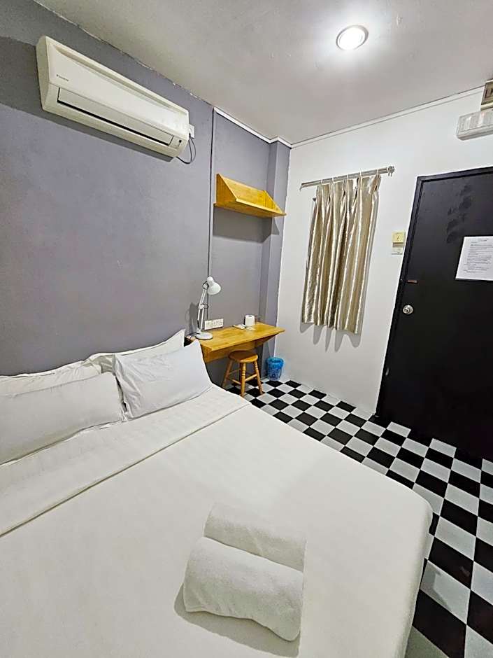 Photo 1 of 10 of Standard Double Room with Shared Bathroom