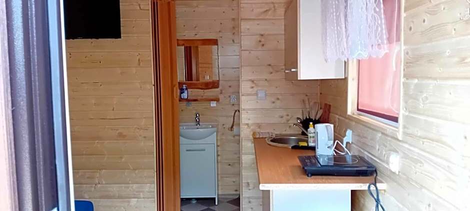 Domki i pokoje ,,Pod Palmami" w centrum