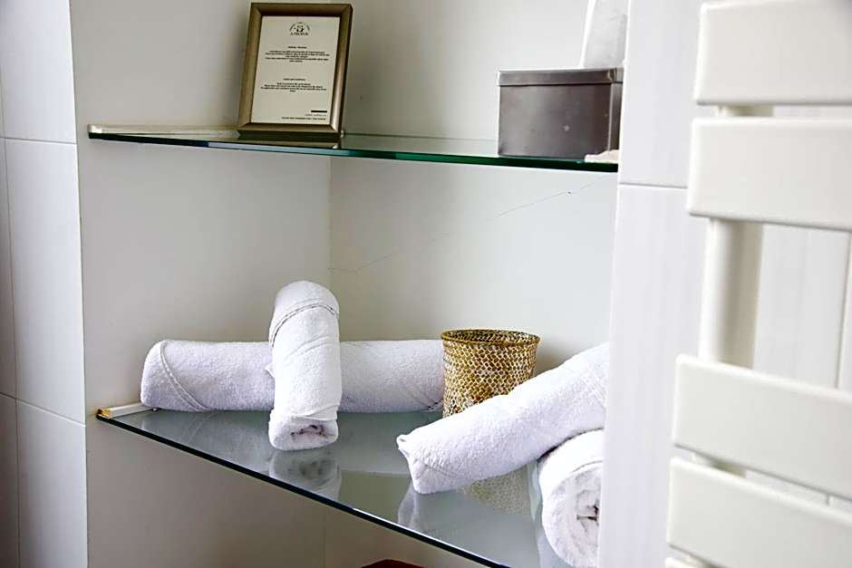 A Propos- Suites et chambres