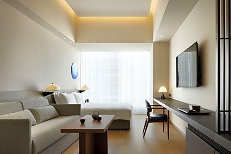 Deluxe King Room with One King Bed and Sofa Bed