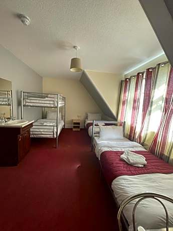 Quadruple Room with Shared Bathroom