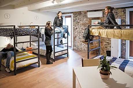 Bed in 6-Bed Female Dormitory Room