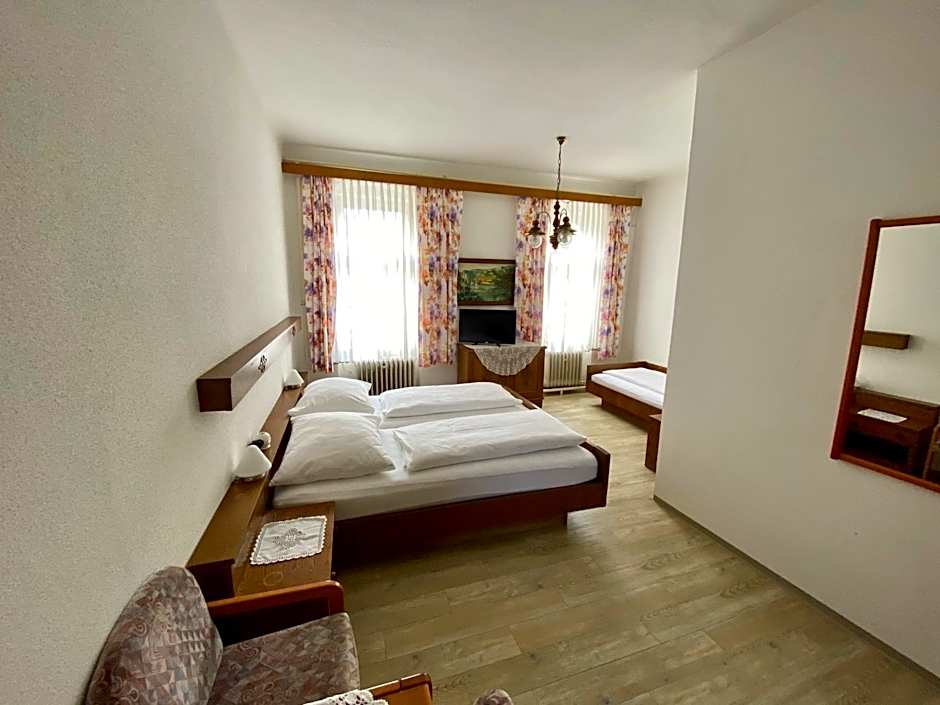 Photo 1 of 7 of Triple Room with Private Bathroom